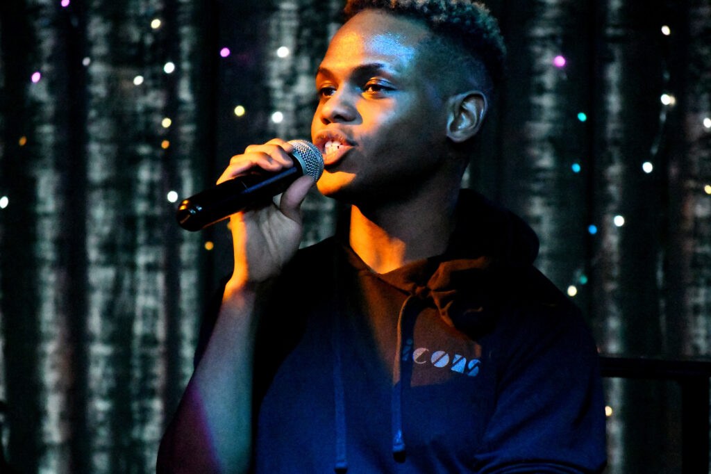 A singer performs at Icons Bar in Downtown Colorado Springs